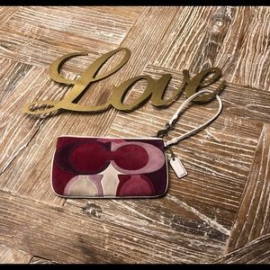 Coach pink optic wristlet